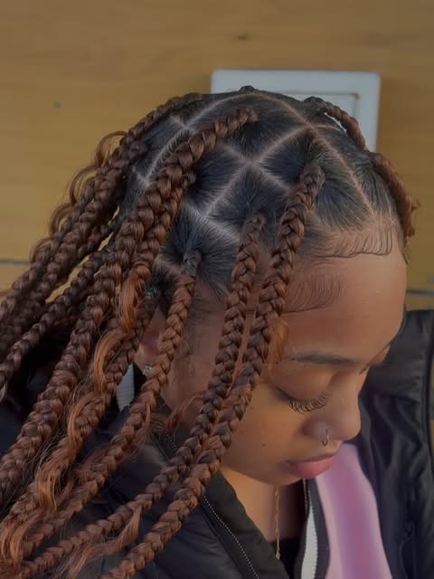 Warm brown knotless braids by Mia